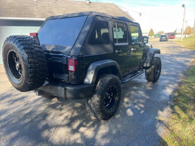 used 2013 Jeep Wrangler Unlimited car, priced at $15,995