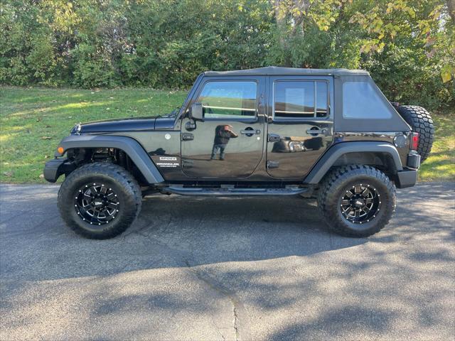 used 2013 Jeep Wrangler Unlimited car, priced at $15,995