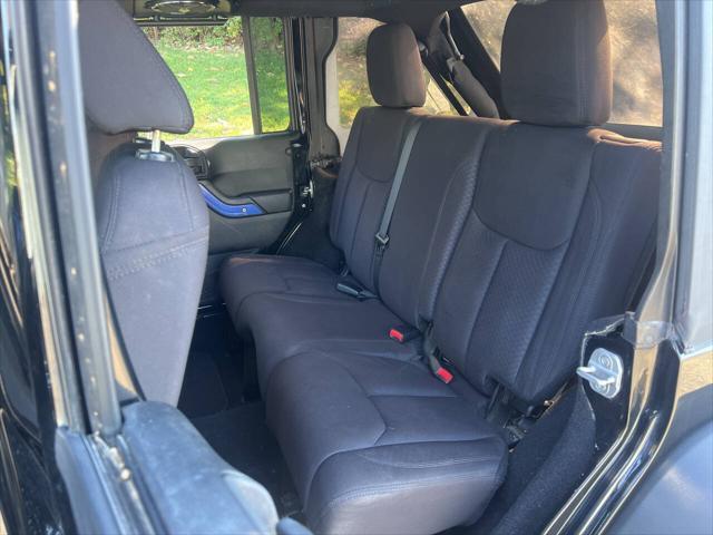 used 2013 Jeep Wrangler Unlimited car, priced at $15,995