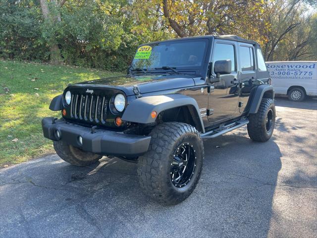 used 2013 Jeep Wrangler Unlimited car, priced at $15,995