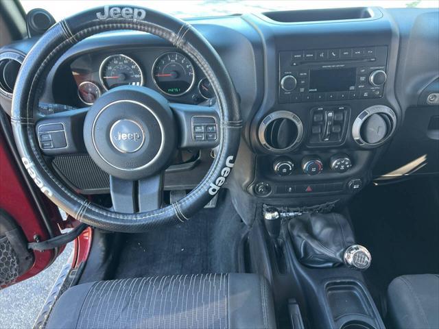 used 2012 Jeep Wrangler Unlimited car, priced at $13,995