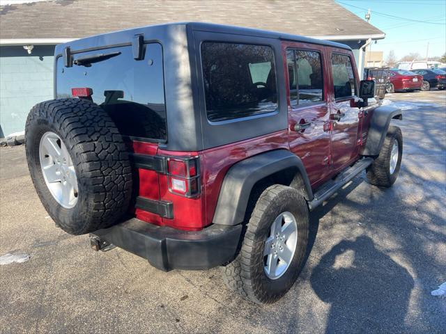 used 2012 Jeep Wrangler Unlimited car, priced at $13,995