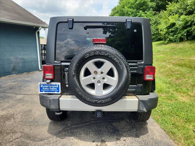 used 2011 Jeep Wrangler Unlimited car, priced at $14,995