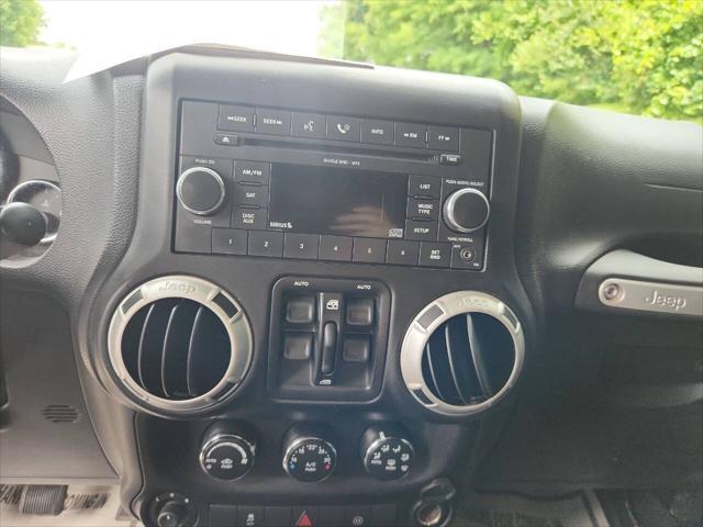 used 2011 Jeep Wrangler Unlimited car, priced at $14,995