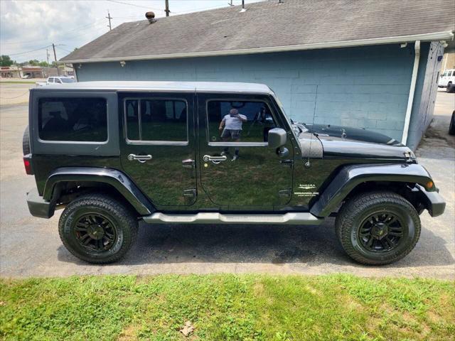 used 2011 Jeep Wrangler Unlimited car, priced at $14,995