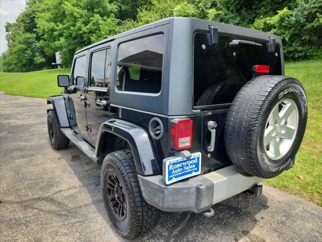used 2011 Jeep Wrangler Unlimited car, priced at $14,995