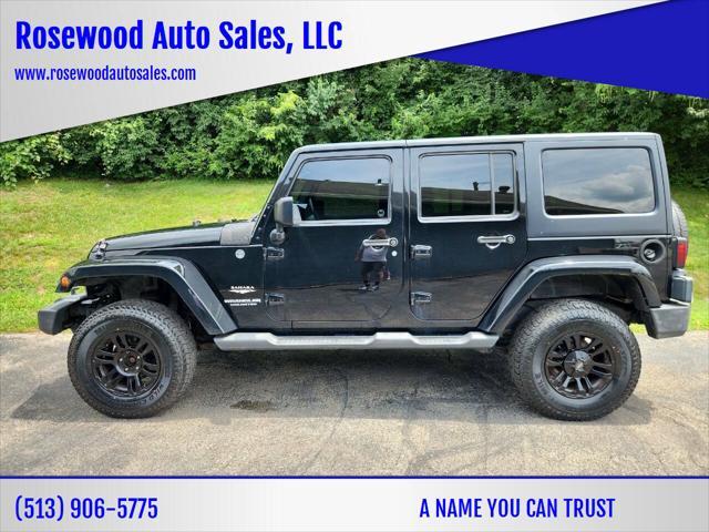 used 2011 Jeep Wrangler Unlimited car, priced at $14,995