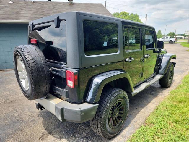 used 2011 Jeep Wrangler Unlimited car, priced at $14,995