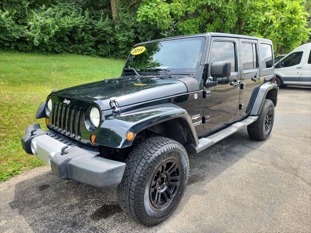 used 2011 Jeep Wrangler Unlimited car, priced at $14,995