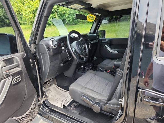 used 2011 Jeep Wrangler Unlimited car, priced at $14,995
