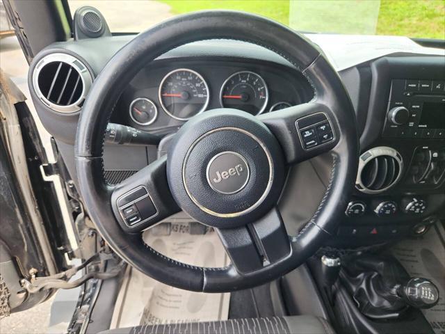 used 2011 Jeep Wrangler Unlimited car, priced at $14,995