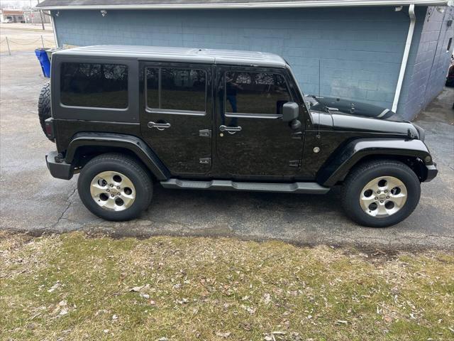 used 2012 Jeep Wrangler Unlimited car, priced at $15,995