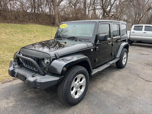 used 2012 Jeep Wrangler Unlimited car, priced at $15,995