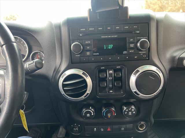 used 2012 Jeep Wrangler Unlimited car, priced at $15,995