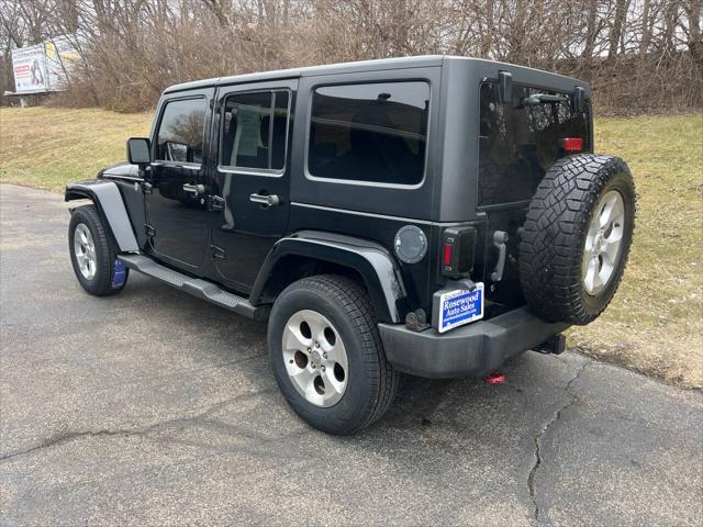 used 2012 Jeep Wrangler Unlimited car, priced at $15,995