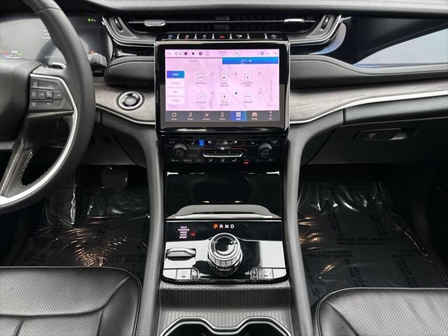 used 2024 Jeep Grand Cherokee 4xe car, priced at $33,876
