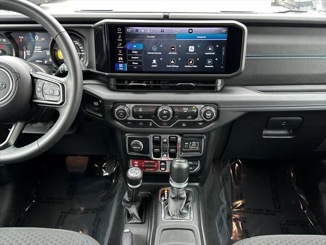 used 2024 Jeep Wrangler 4xe car, priced at $37,651