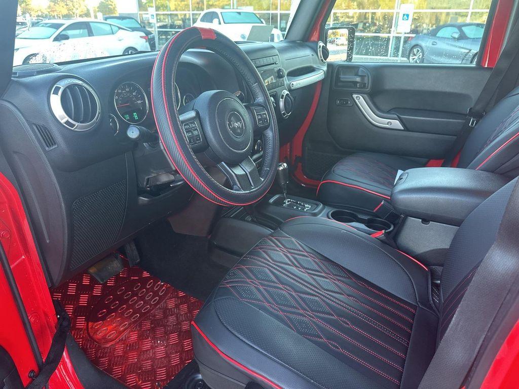 used 2018 Jeep Wrangler JK Unlimited car, priced at $21,399