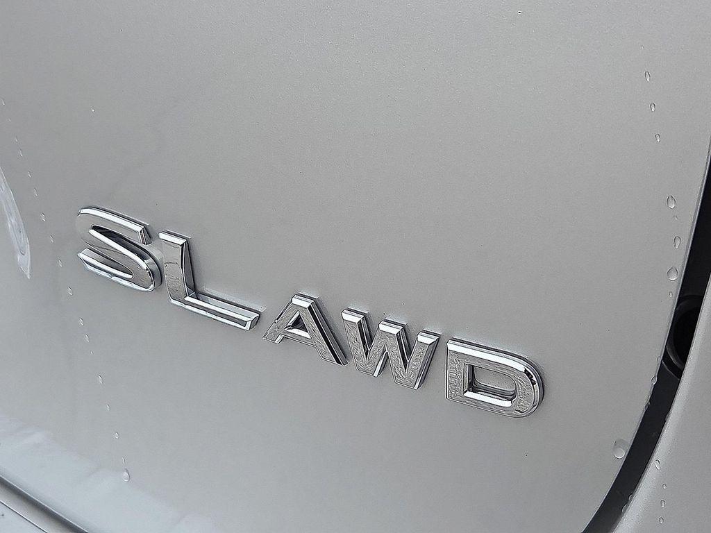 used 2022 Nissan Rogue Sport car, priced at $26,534