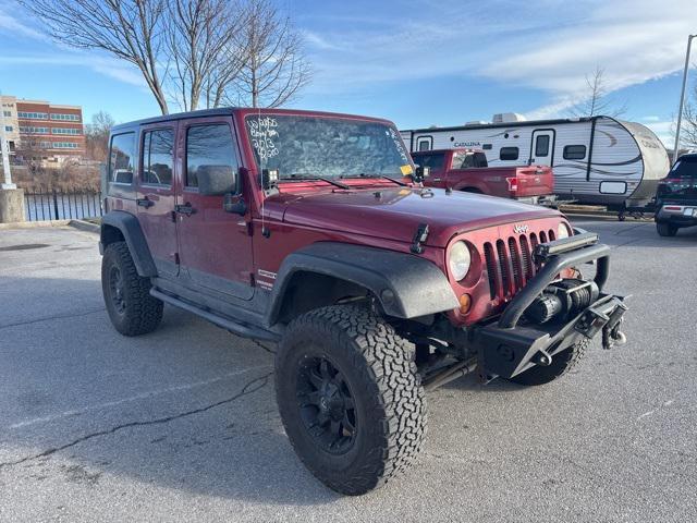 used 2013 Jeep Wrangler Unlimited car, priced at $16,989