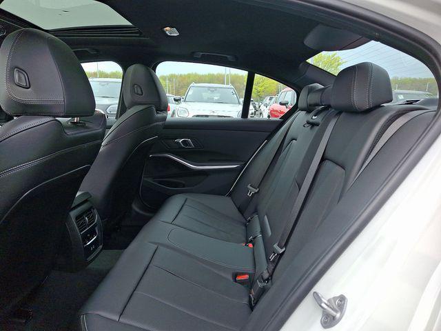 new 2025 BMW 330 car, priced at $50,145