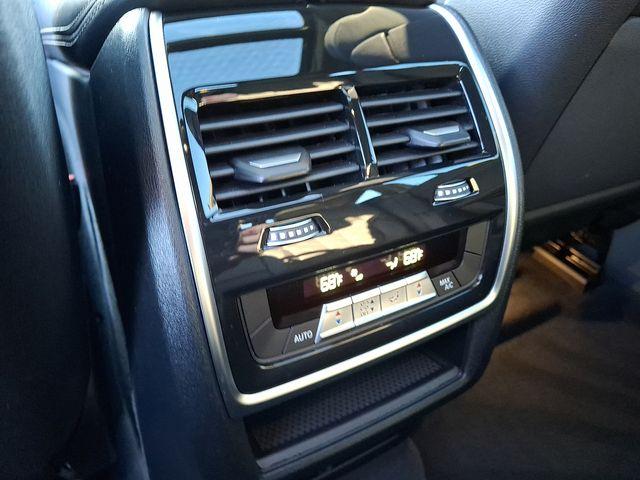 used 2023 BMW X6 car, priced at $62,890