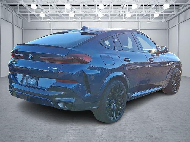 used 2023 BMW X6 car, priced at $62,890