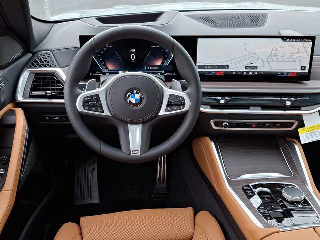 new 2025 BMW X6 car, priced at $81,960