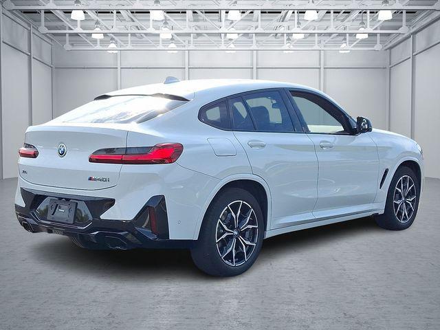 used 2023 BMW X4 car, priced at $55,995