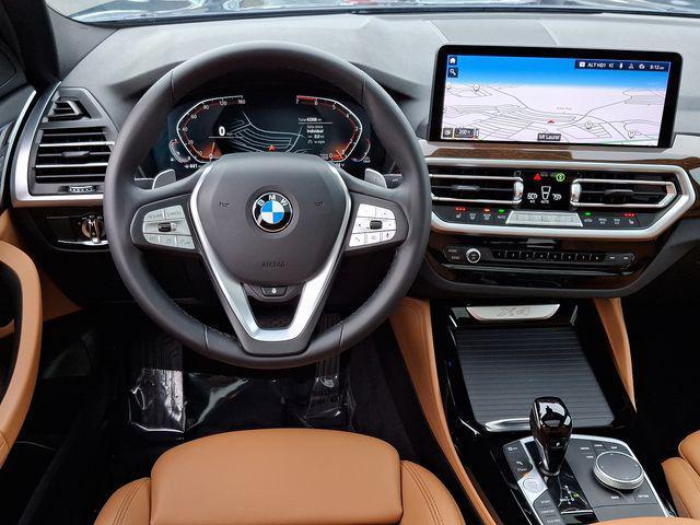 used 2022 BMW X4 car, priced at $39,940