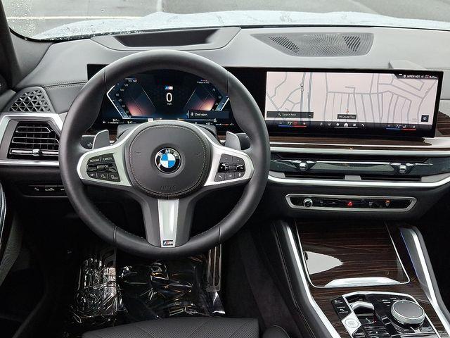 used 2025 BMW X6 car, priced at $71,299
