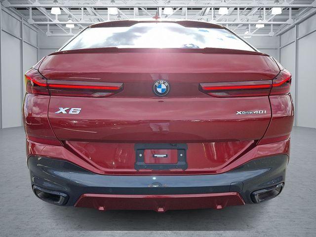 used 2023 BMW X6 car, priced at $57,540