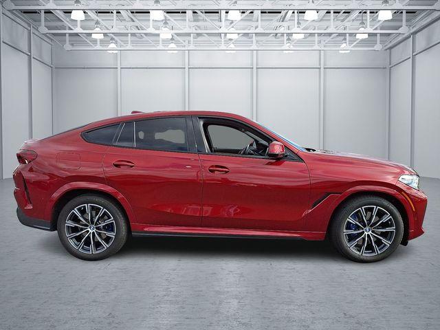 used 2023 BMW X6 car, priced at $57,540