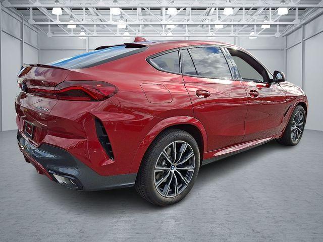 used 2023 BMW X6 car, priced at $57,540