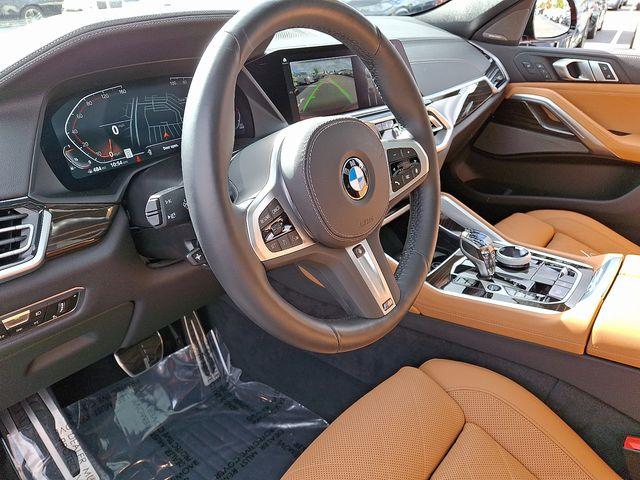 used 2023 BMW X6 car, priced at $57,540