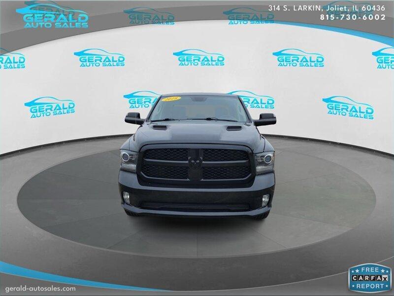 used 2018 Ram 1500 car, priced at $26,904