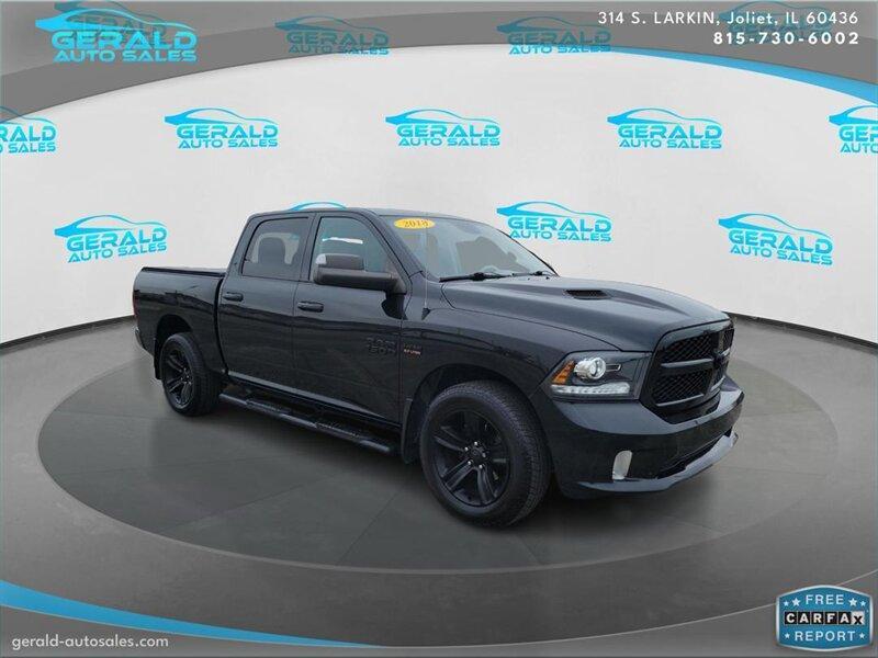 used 2018 Ram 1500 car, priced at $26,904