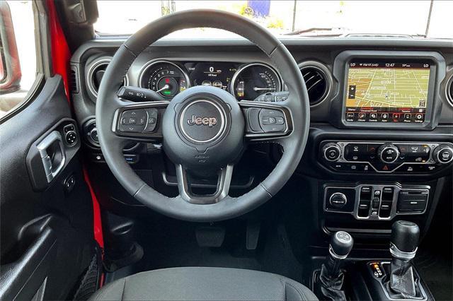 used 2023 Jeep Wrangler 4xe car, priced at $38,997