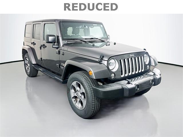 used 2018 Jeep Wrangler JK Unlimited car, priced at $23,836