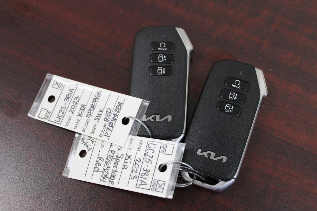 used 2023 Kia Sportage Plug-In Hybrid car, priced at $26,900