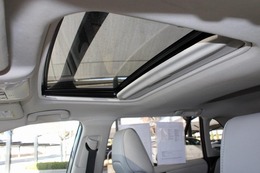 used 2021 Toyota RAV4 Hybrid car, priced at $29,900
