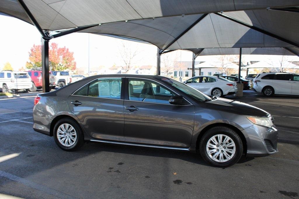 used 2014 Toyota Camry car, priced at $12,900