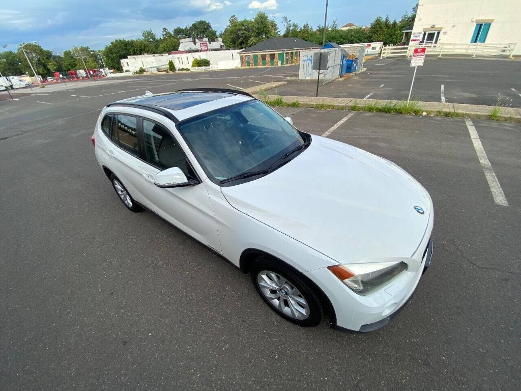 used 2013 BMW X1 car, priced at $7,495