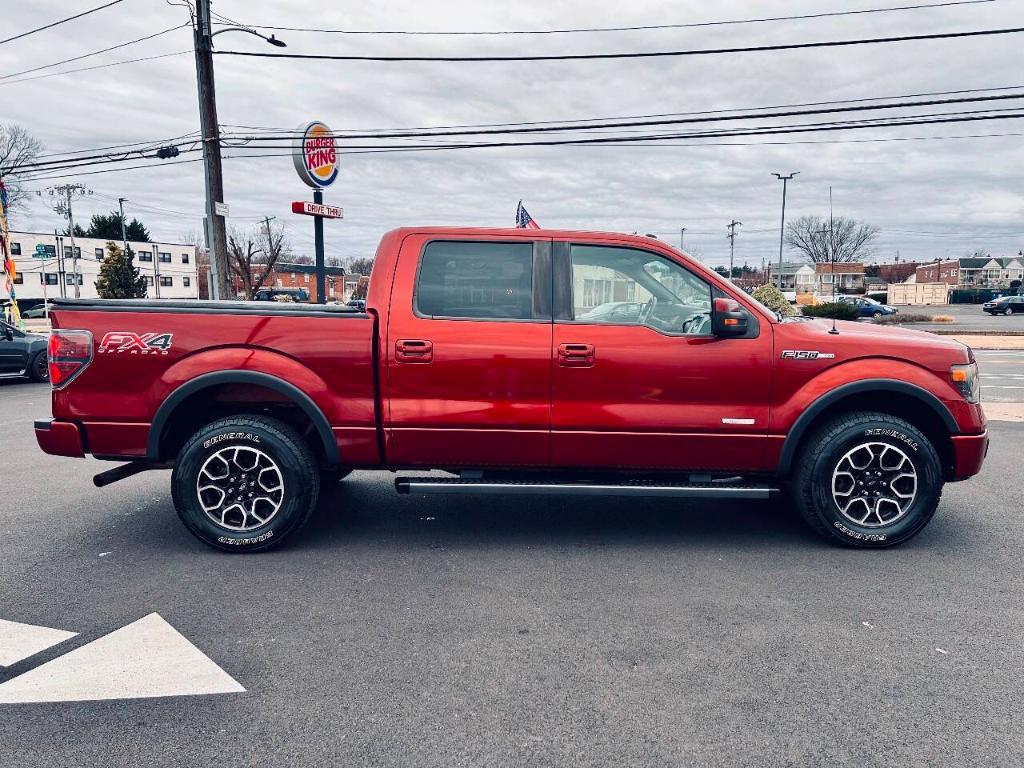 used 2014 Ford F-150 car, priced at $14,695