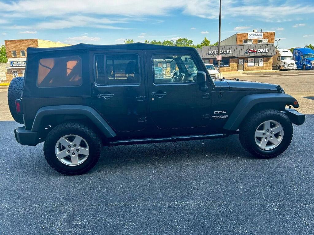 used 2015 Jeep Wrangler Unlimited car, priced at $14,995