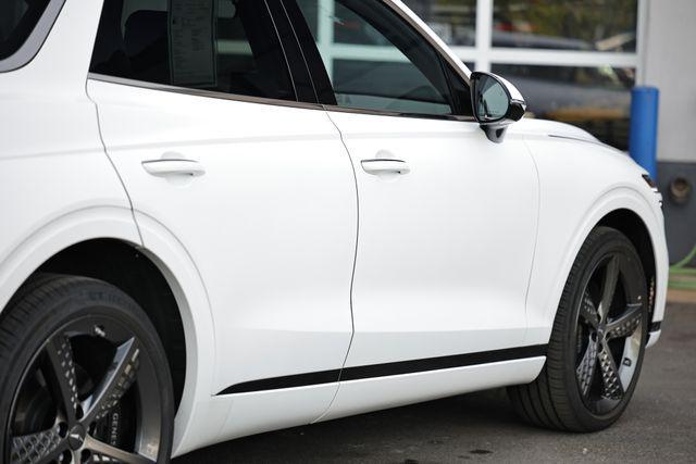 used 2024 Genesis GV70 car, priced at $54,318
