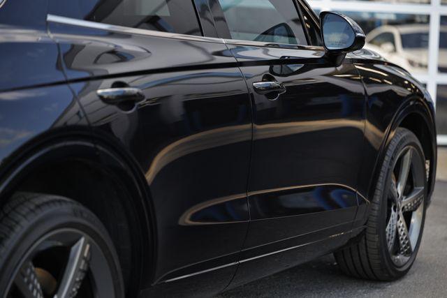 used 2024 Genesis GV70 car, priced at $53,421
