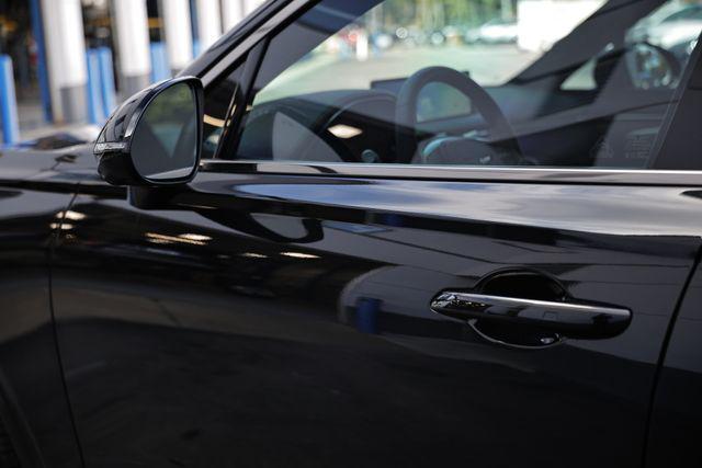 used 2024 Genesis GV70 car, priced at $53,421