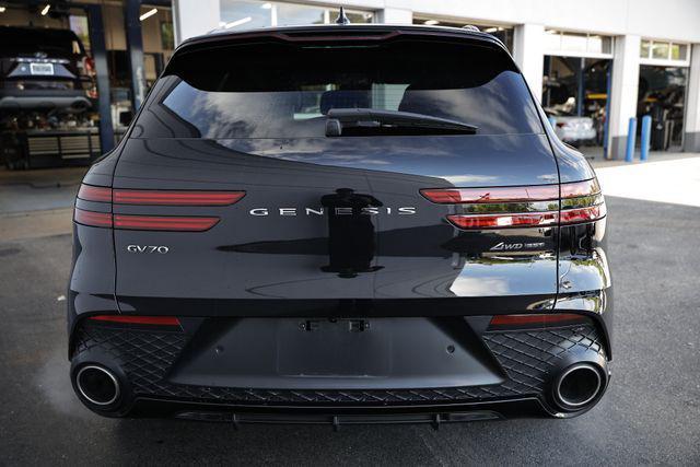 used 2024 Genesis GV70 car, priced at $53,421