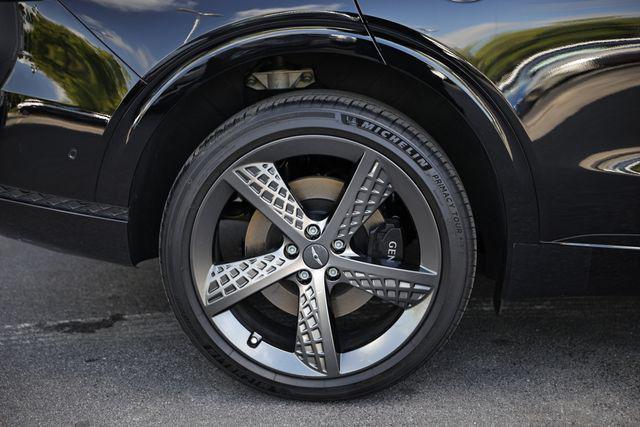 used 2024 Genesis GV70 car, priced at $53,421
